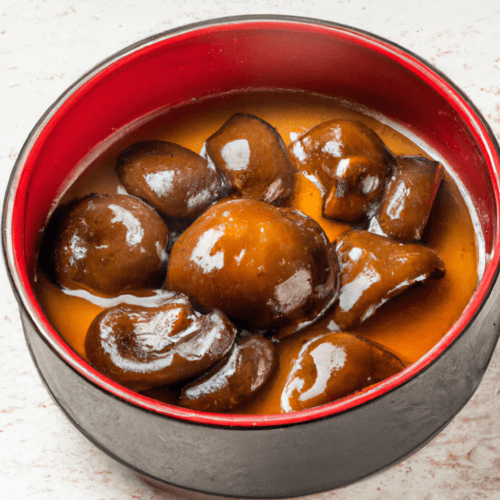 Shiitake mushrooms in a Japanese-style sauce Representation of a cookedShiitake mushrooms in a Japanese-style sauce